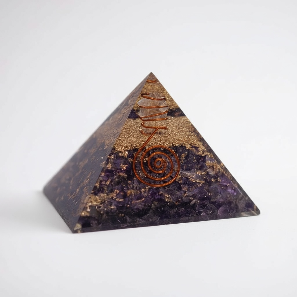 Amethyst orgonite pyramid for energy cleansing and chakra balancing, featuring layered resin, metal, and natural amethyst to promote spiritual protection, intuition, and harmonious energy flow.