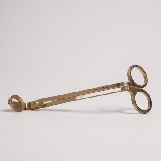 Recortadora de mecha de vela dorada 