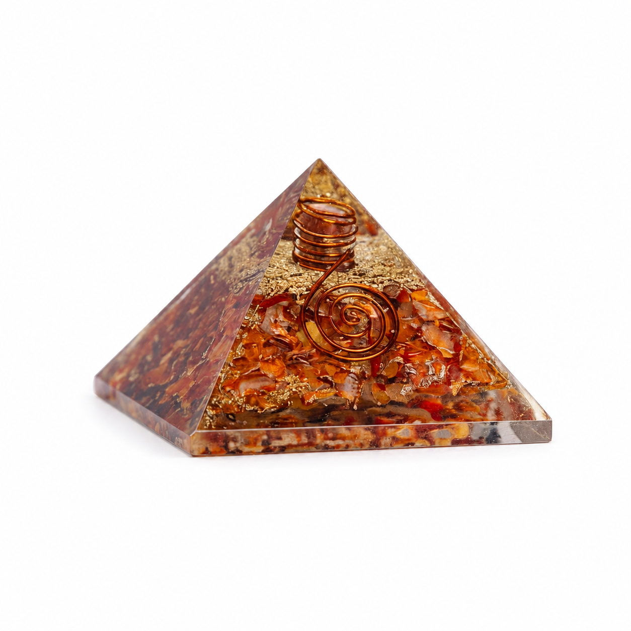 Carnelian orgonite pyramid with copper spiral and crystal layers on clean white background by Journey of Atman.
