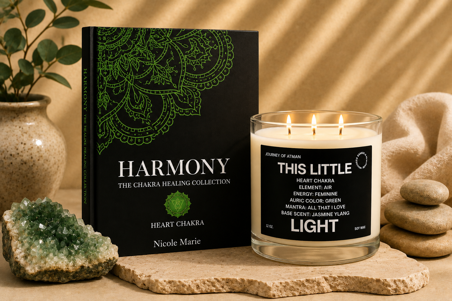 Heart chakra healing bundle by Journey of Atman featuring the Harmony journal and This Little Light affirmation candle styled in a warm spa-inspired setting with green crystal accents, natural textures, and soft ambient lighting.