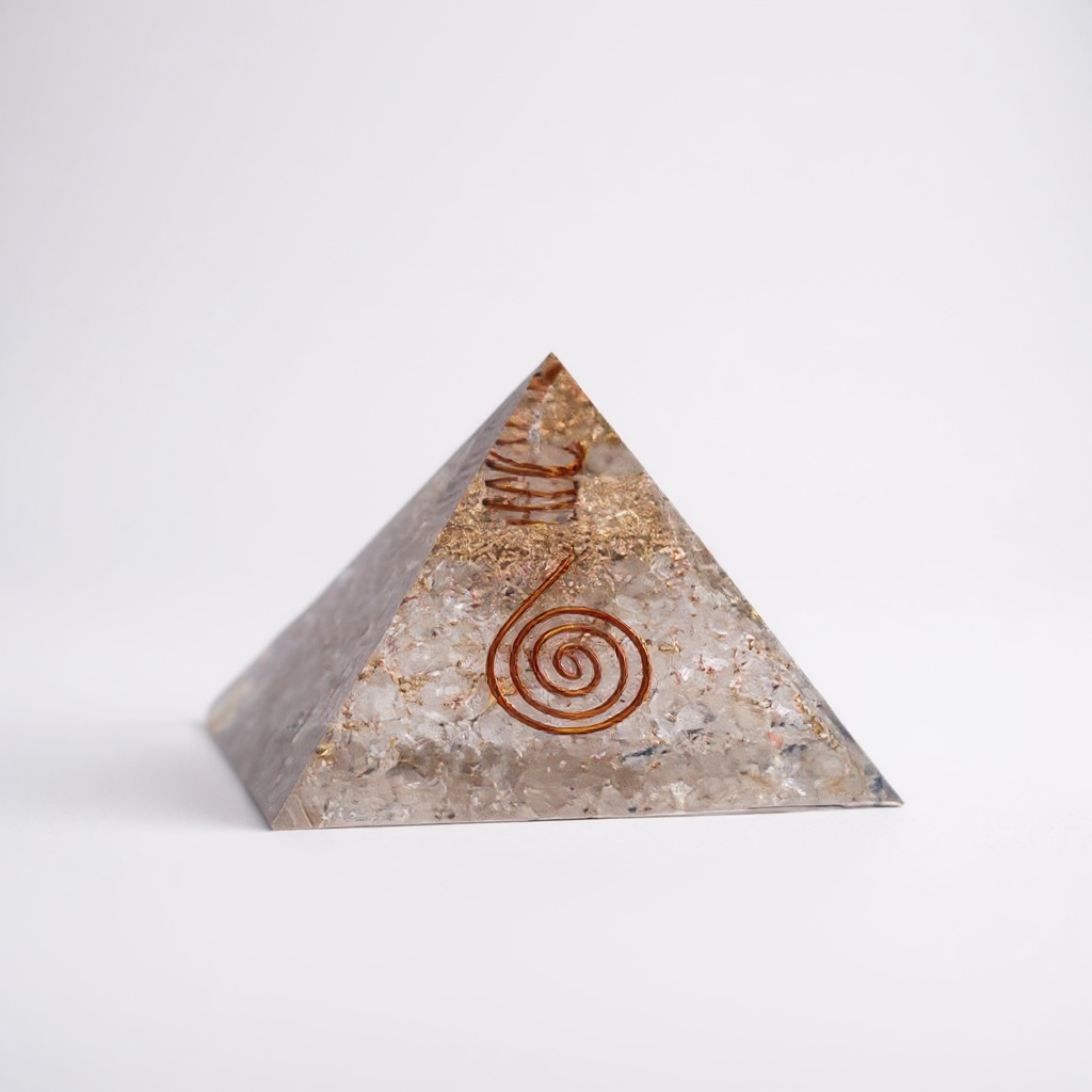 Clear Quartz orgonite pyramid for Crown Chakra and overall energy healing, crafted with layered resin, metal, and natural clear quartz to amplify spiritual awareness, clarity, and harmonious energy flow.