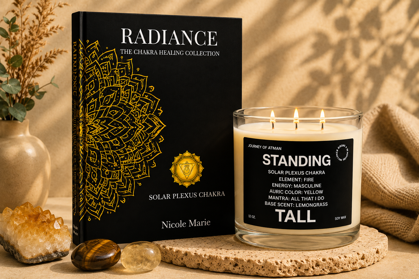 Solar plexus chakra healing bundle by Journey of Atman featuring the Radiance journal and Standing Tall affirmation candle styled in a warm luxury wellness setting with golden crystal accents, grounding stone textures, and soft ambient light.