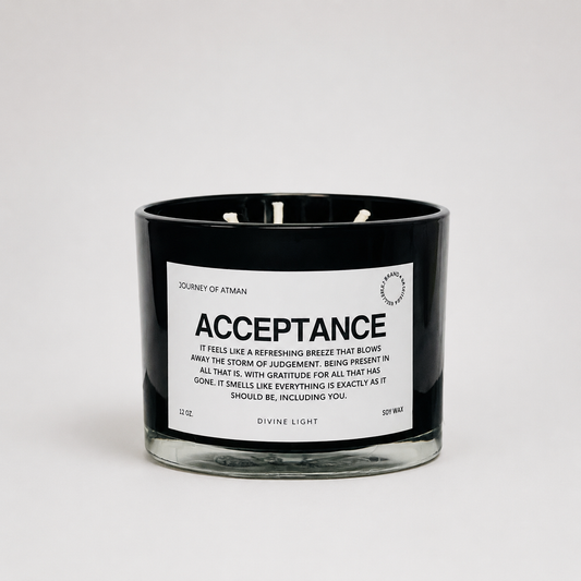 Acceptance affirmation candle in black glass vessel with white label on clean white background supporting peace, self-compassion, and grounding.