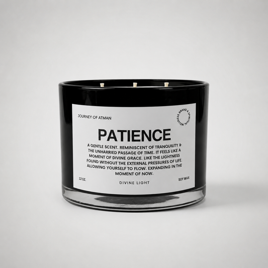 Patience affirmation candle in black glass vessel with white label on clean white background for mindfulness, trust, and emotional steadiness.