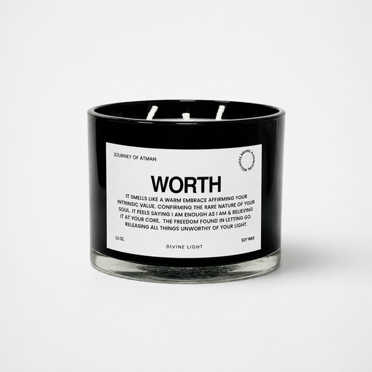 Worth affirmation candle in black glass vessel with white label on clean white background supporting self-worth and confidence.
